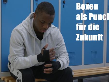 Boxer sitzt in einer Umkleide