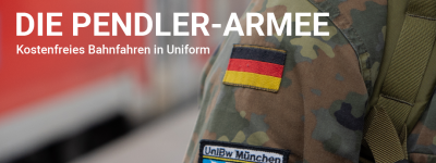 Offizieranwärter der UniBw München in Uniform am Gleis des Münchner Hauptbahnhofs.
